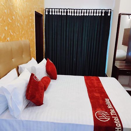 Hotel The Holiday Lahore Bagian luar foto