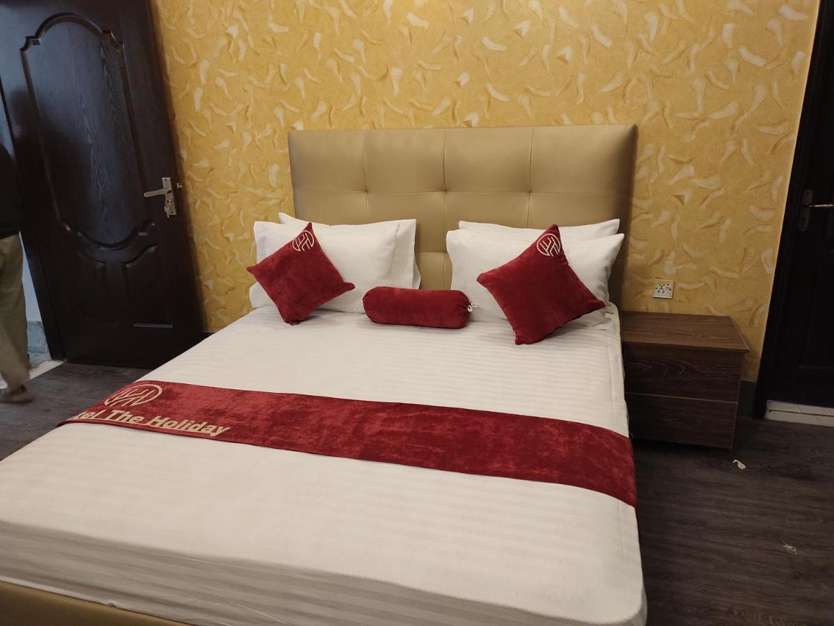 Hotel The Holiday Lahore Bagian luar foto